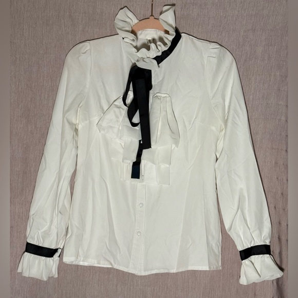 Elegant White Ruffle Blouse with Black Accents - Picture 2 of 7
